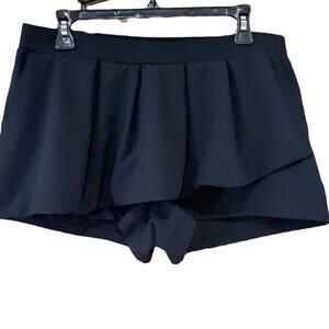 Fabletics Black Skirt Front Shorts in a size medium.